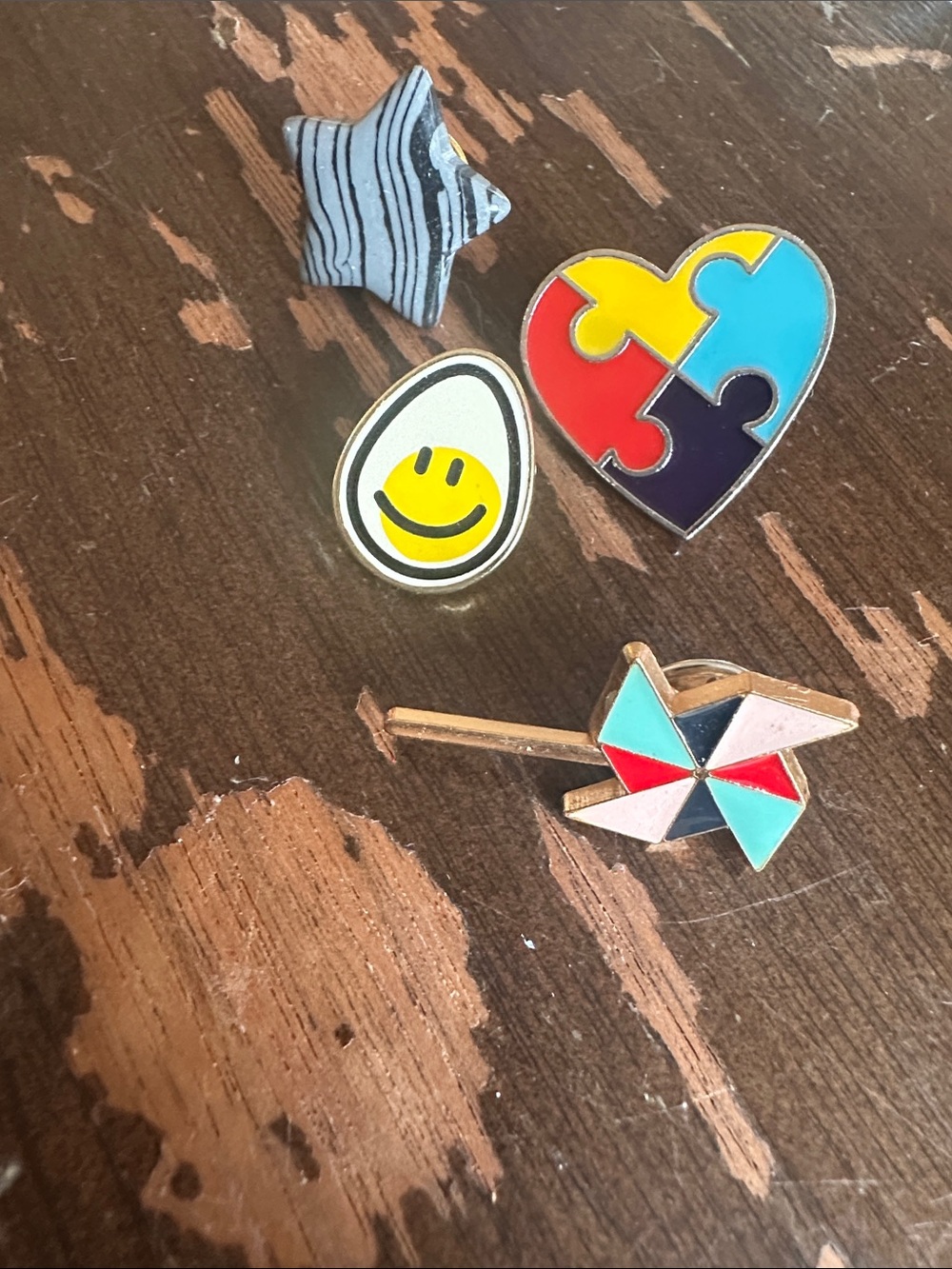 lot of happy pin backs